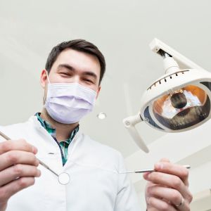 Experienced dentist treating a patient at Clear Dental Parramatta